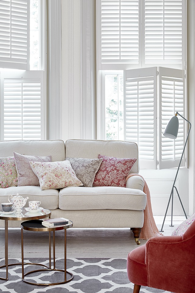 Cream and peach lounge with white shutters